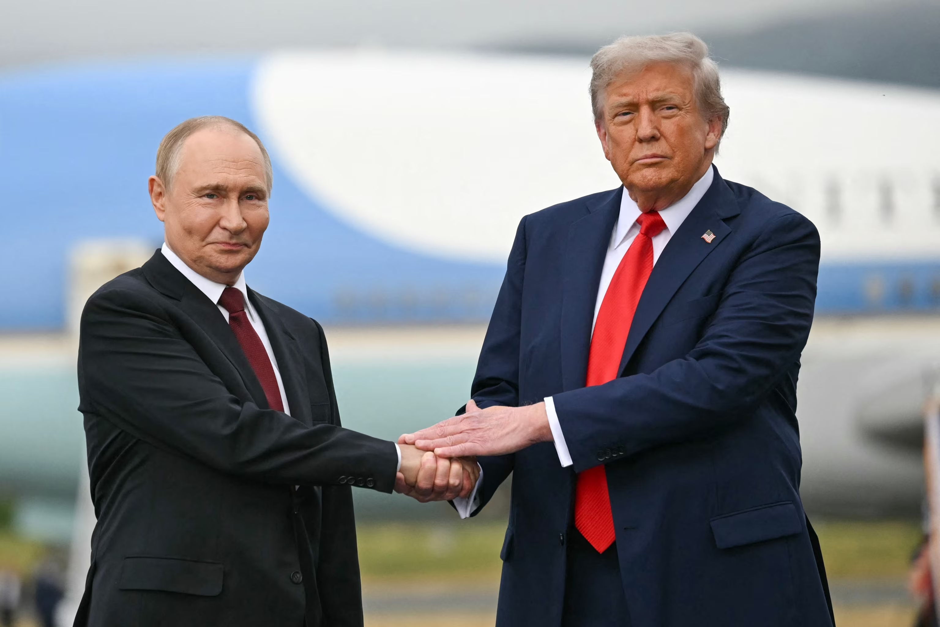 Putin Trampı təriflədi