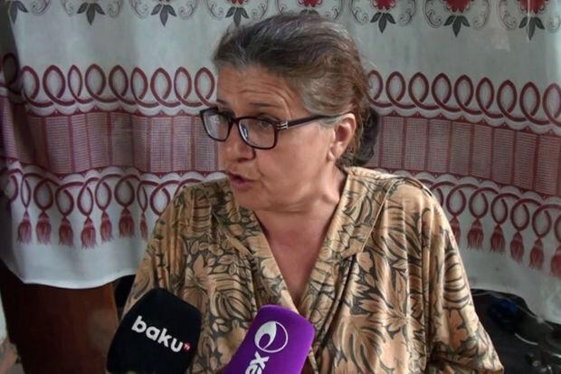 81 yaşlı kişini ütü ilə öldürməkdə günahlandırılan qadın DANIŞDI - VİDEO