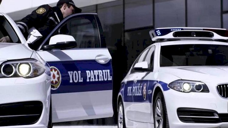 Polis maşınının üzərinə benzin töküb yandırmaqla hədələdi