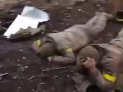 Rusiya hərbçilərindən növbəti müharibə cinayəti - Silahsız hərbi əsirləri... (18+ GÖRÜNTÜLƏR)